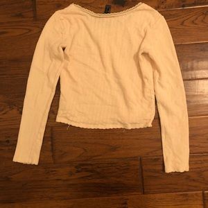 Cream color crop top size small.